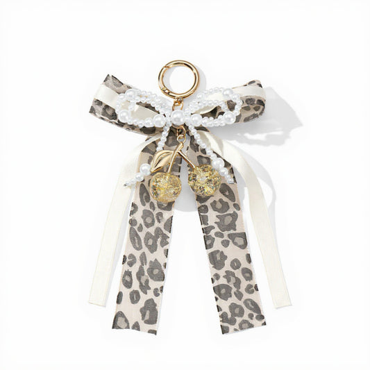 Anna-Kaci Leopard Print Ribbon Keychain with Pearl Bow and Cherry Charms