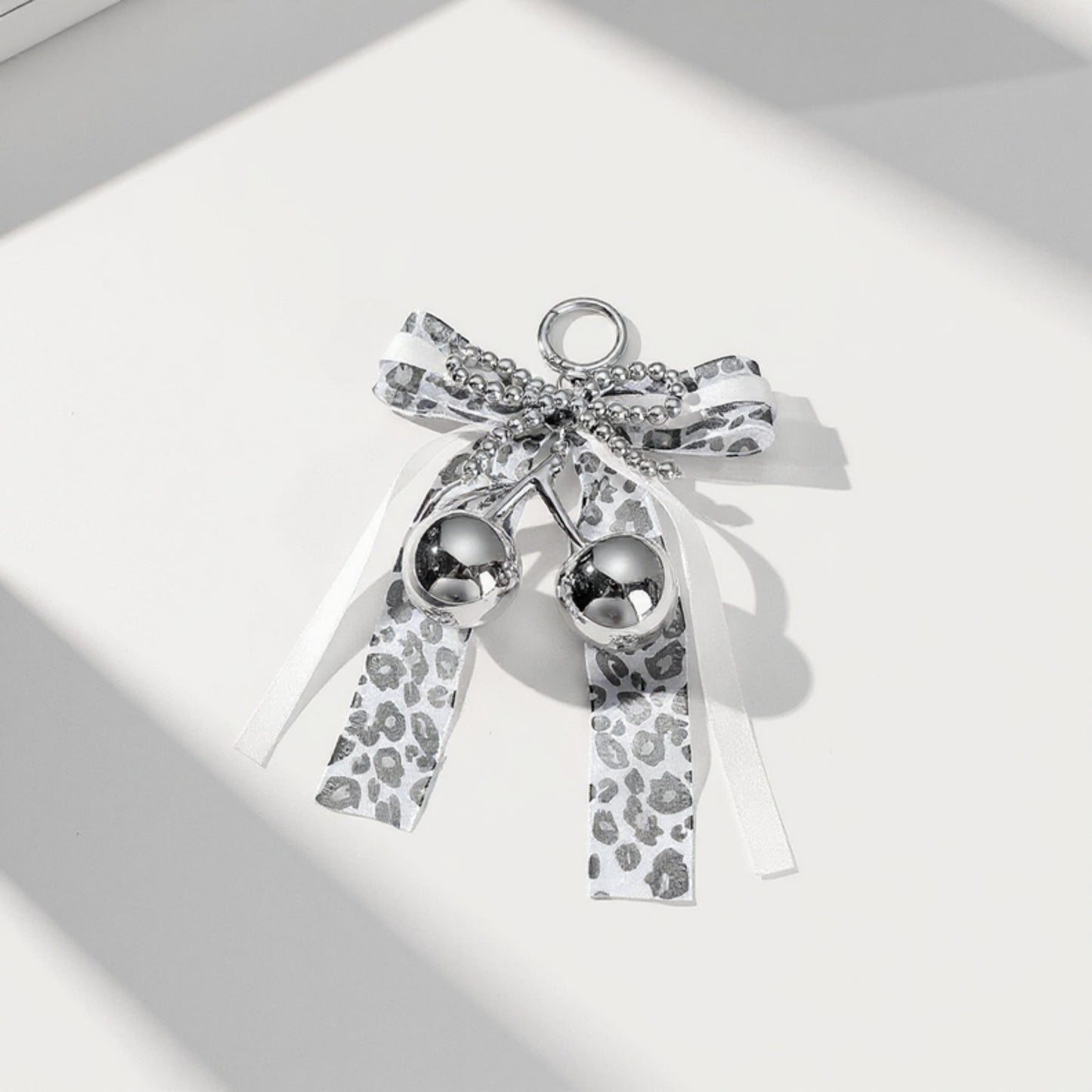 Anna-Kaci Leopard Print Ribbon Keychain with Pearl Bow and Cherry Charms