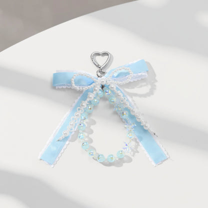 Anna-Kaci Blue Ribbon Keychain with Pearl Bow and Iridescent Beaded Star Charms