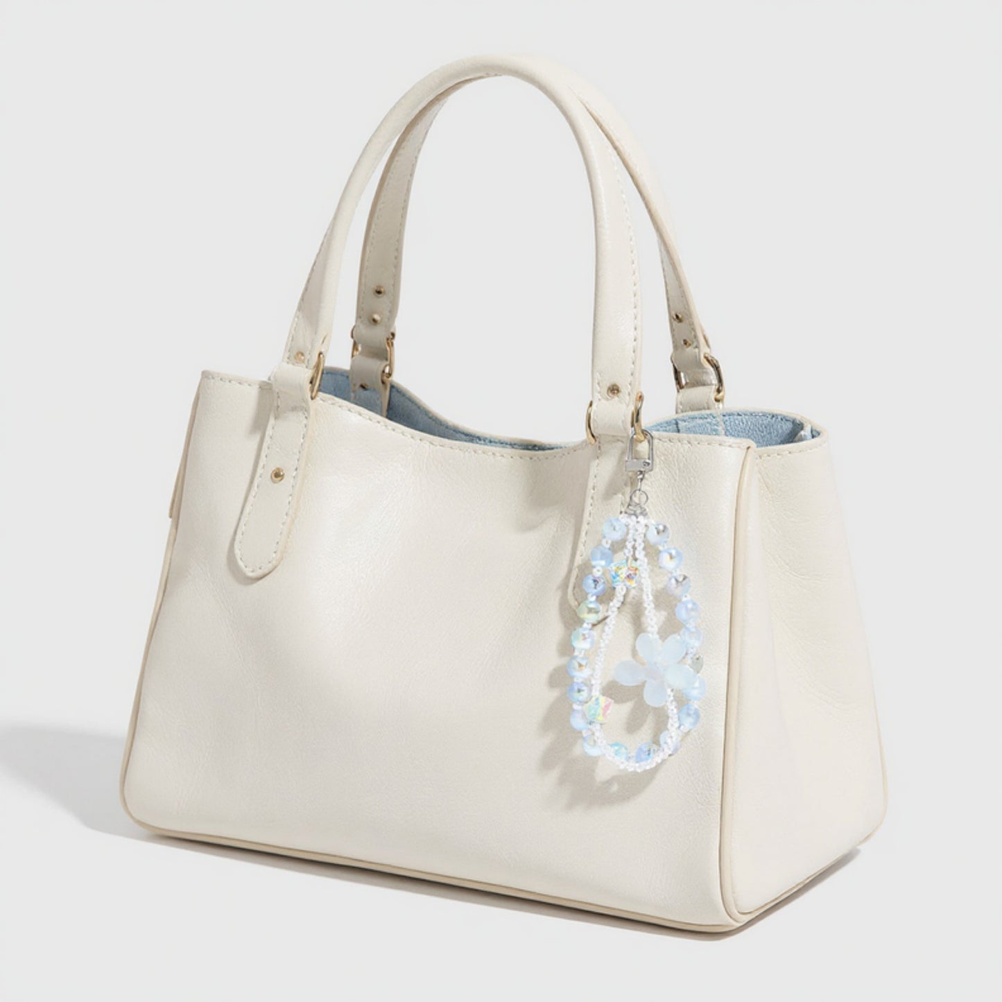 Anna-Kaci 2-Piece Blue Beaded Keychain with Flower Charm and Silver Star Accents