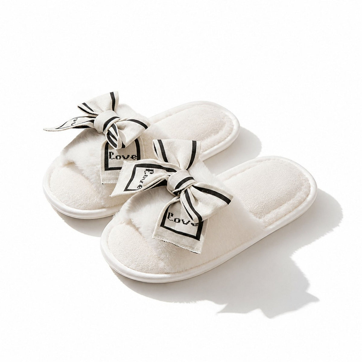 Pantuflas de peluche tipo sandalia para mujer Anna-Kaci con lazo y detalle gráfico
