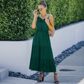 Vestido con tirantes y dobladillo con volantes en color liso