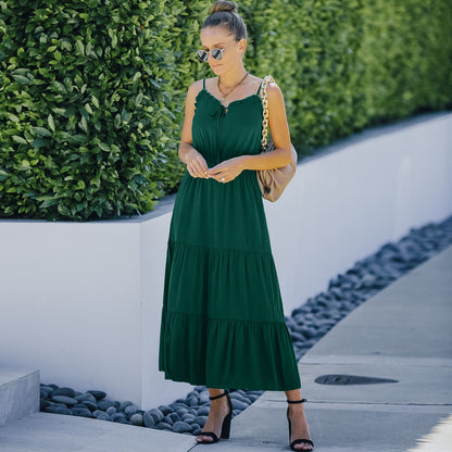 Vestido con tirantes y dobladillo con volantes en color liso