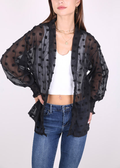 Cárdigan con mangas de obispo y puntos con clip