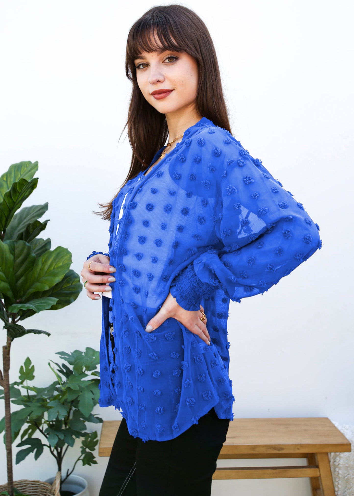 Cárdigan con mangas de obispo y puntos con clip