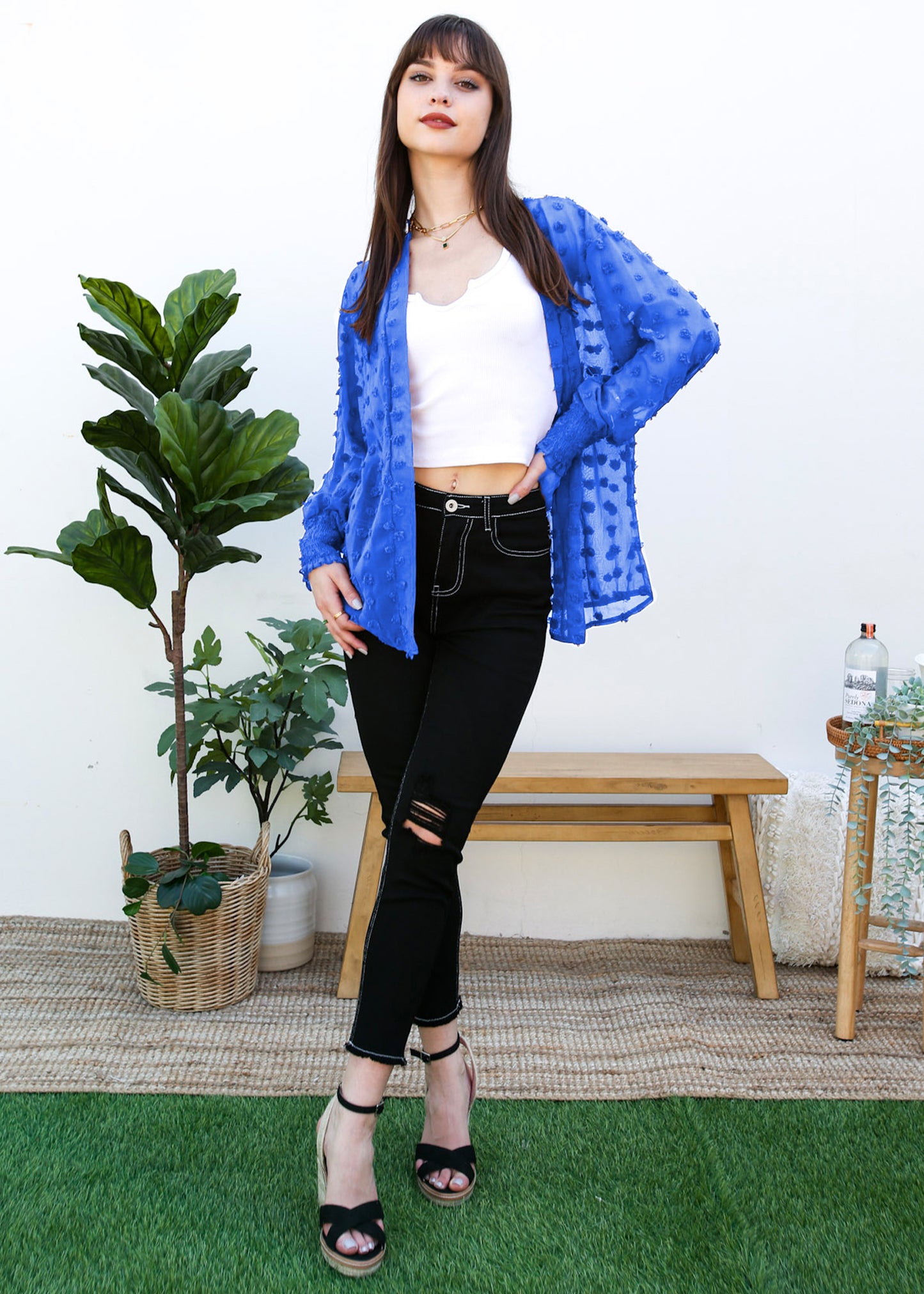 Cárdigan con mangas de obispo y puntos con clip