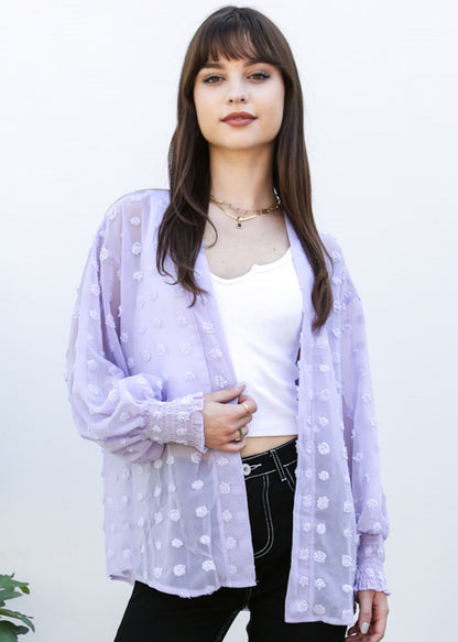 Cárdigan con mangas de obispo y puntos con clip