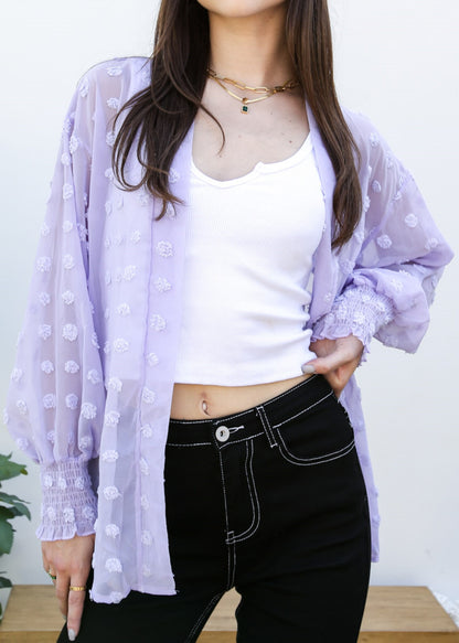 Cárdigan con mangas de obispo y puntos con clip