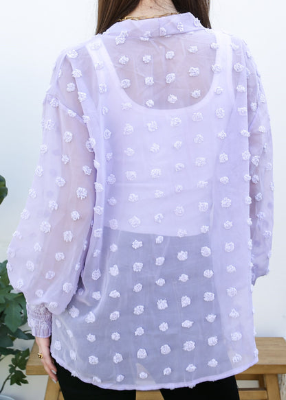 Cárdigan con mangas de obispo y puntos con clip