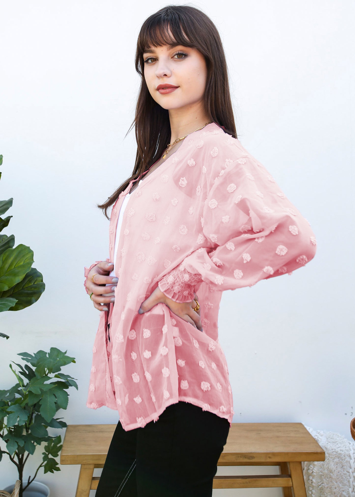 Cárdigan con mangas de obispo y puntos con clip