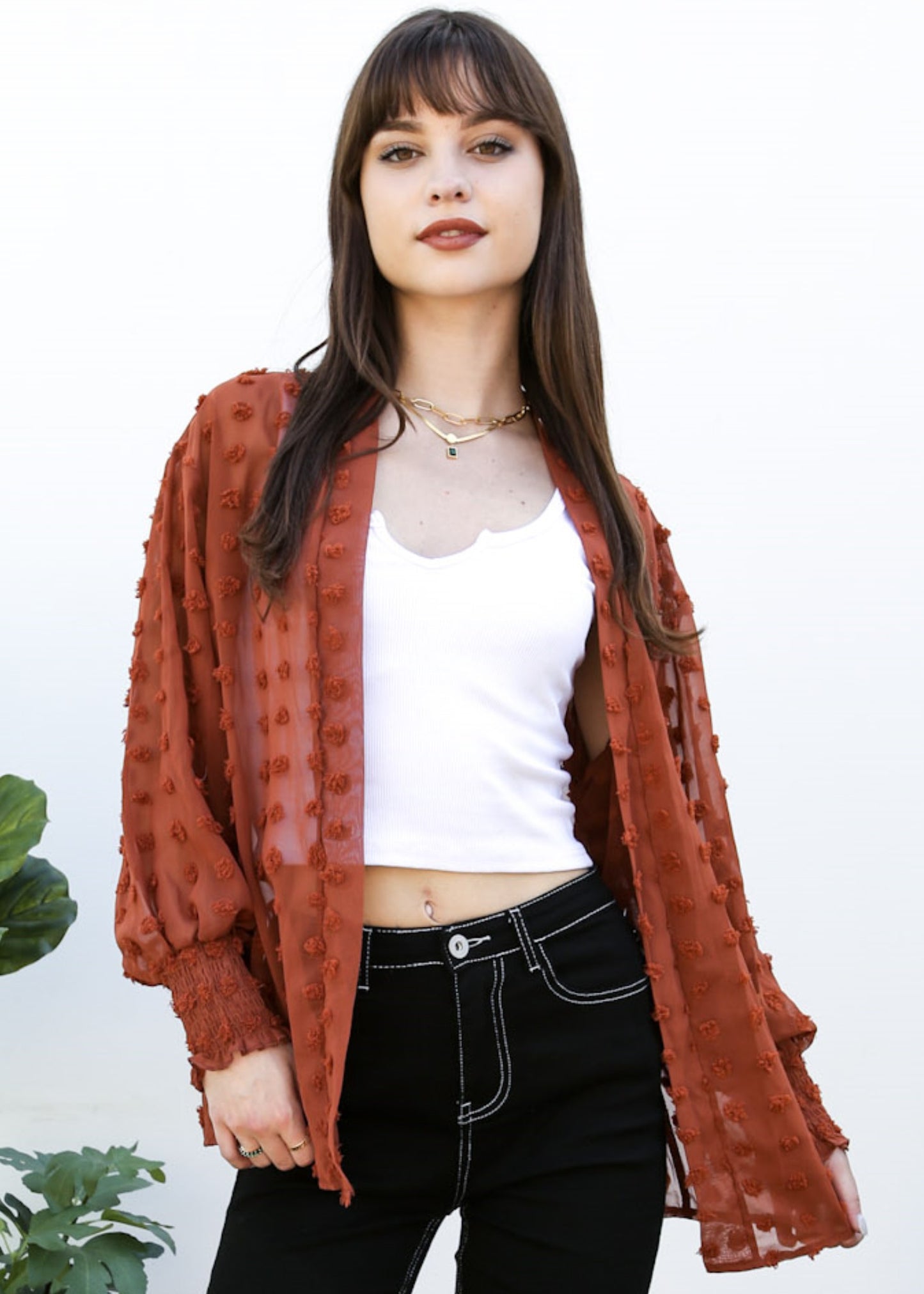 Cárdigan con mangas de obispo y puntos con clip