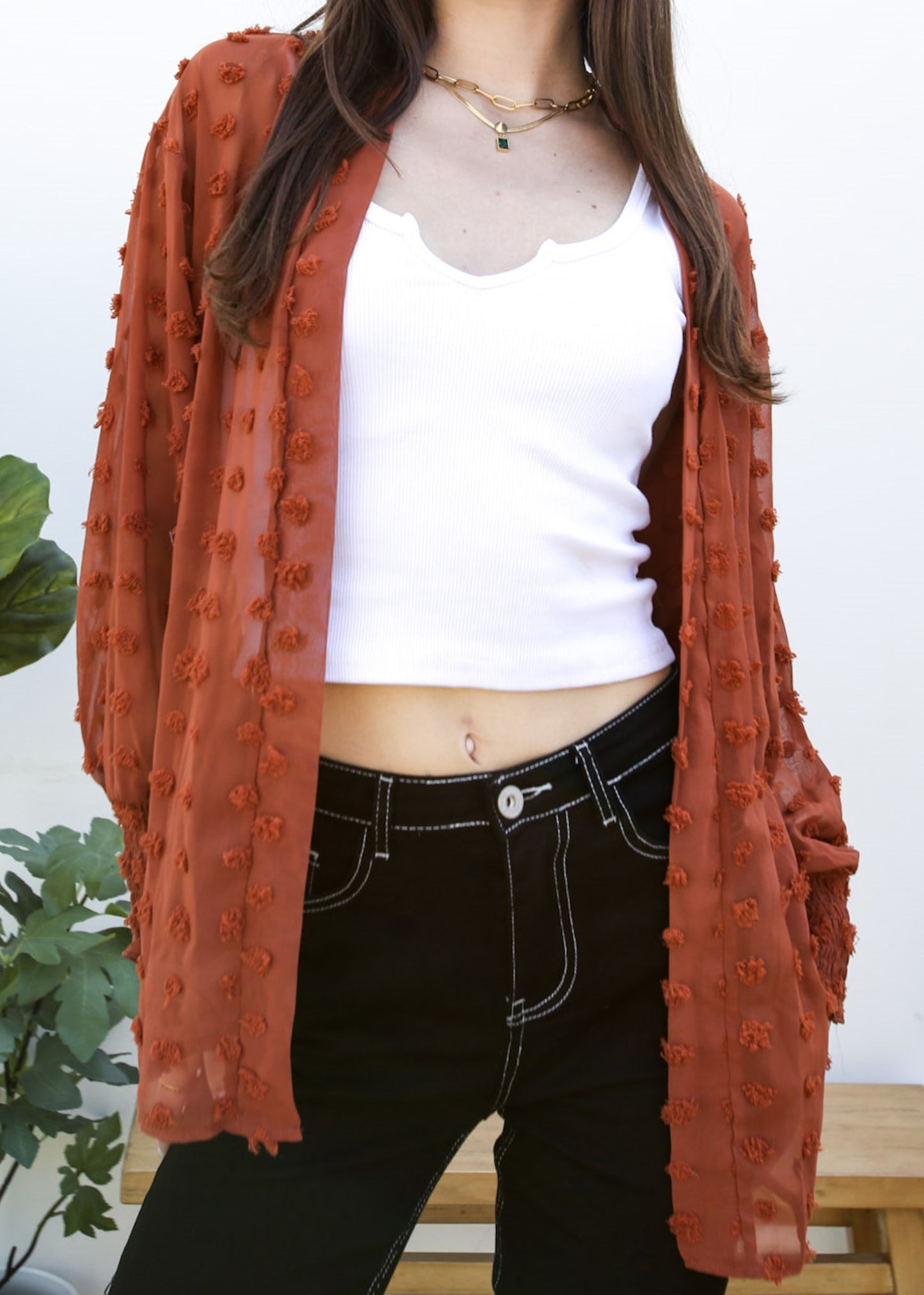 Cárdigan con mangas de obispo y puntos con clip