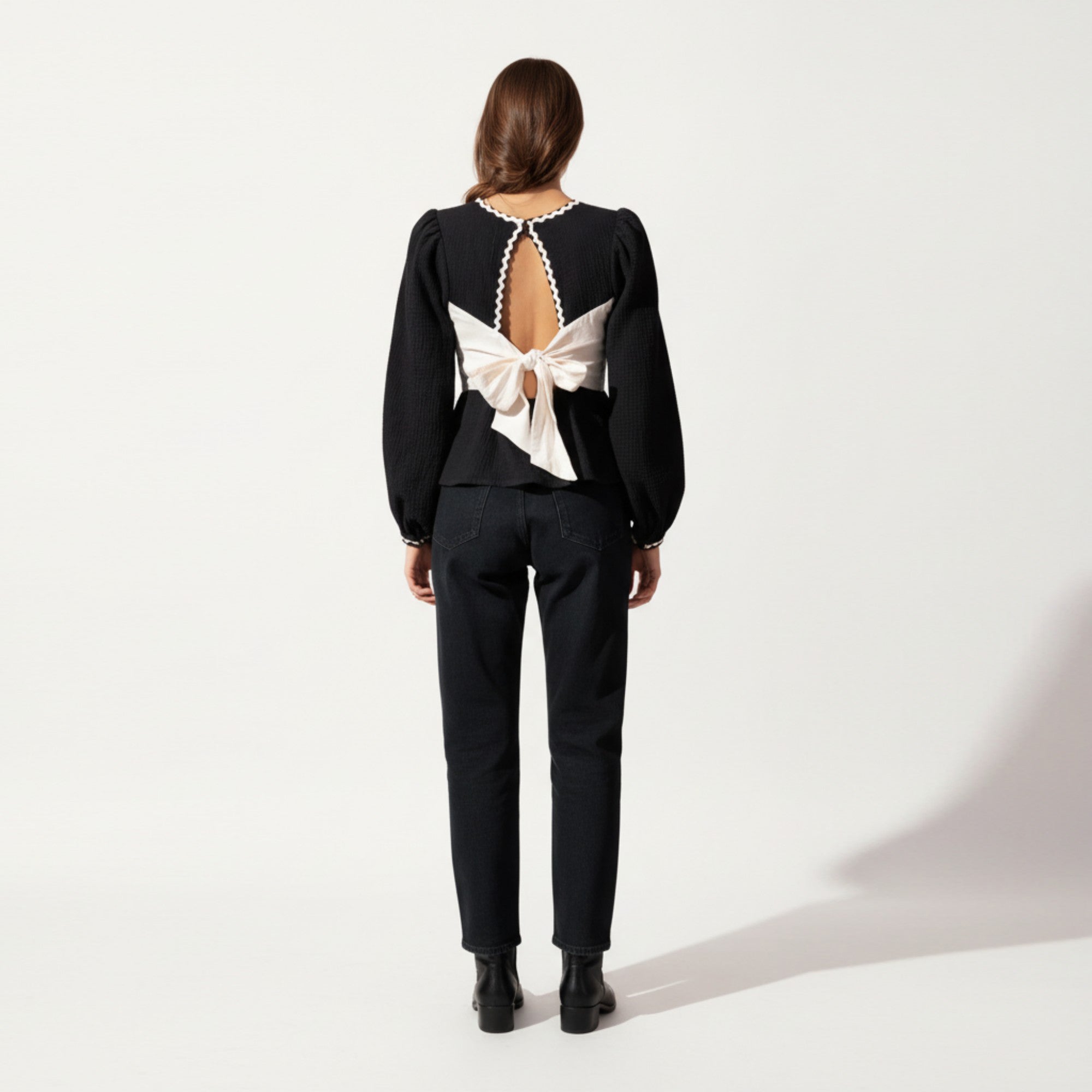 Anna-Kaci Women's Long Sleeve Textured Peplum Top with Contrast Trim Accents and Statement Bow Detail