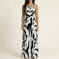 Anna-Kaci Sleeveless Printed Wide Leg Jumpsuit with Halter Neck Waist Tie Detail Relaxed Fit