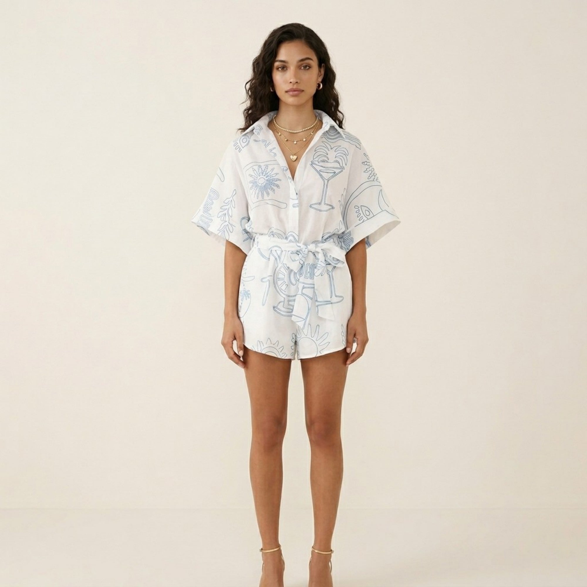 Anna-Kaci Short Sleeve Printed Romper with Collared Neckline Button Front Closure Waist Tie Relaxed Fit