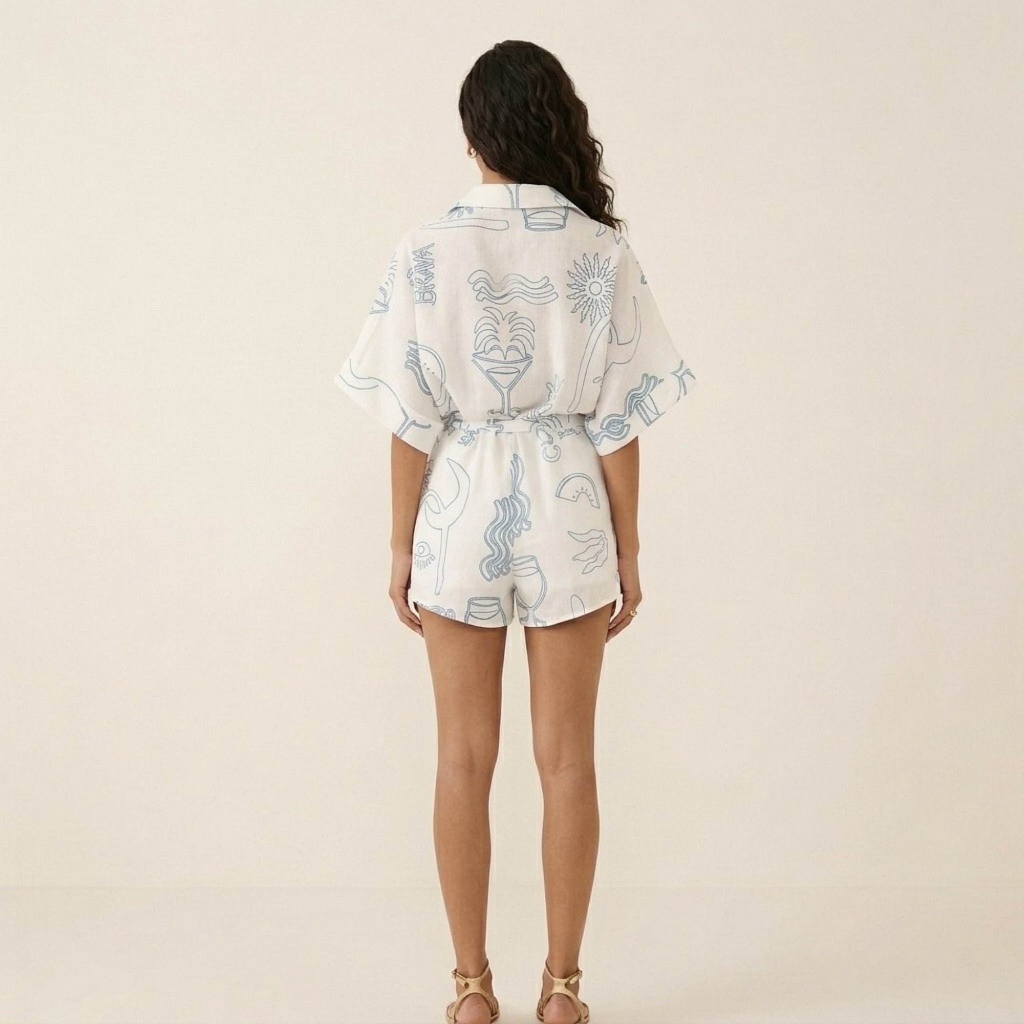 Anna-Kaci Short Sleeve Printed Romper with Collared Neckline Button Front Closure Waist Tie Relaxed Fit