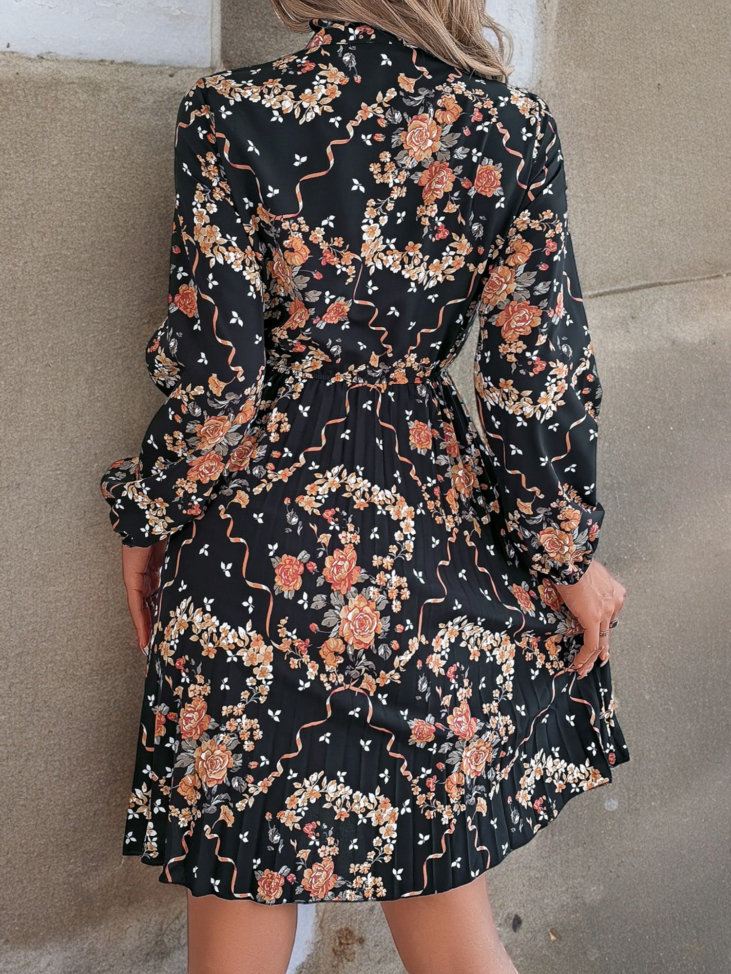 Long Sleeve Floral Print Dress with Bow Tie Neck and Pleated Skirt