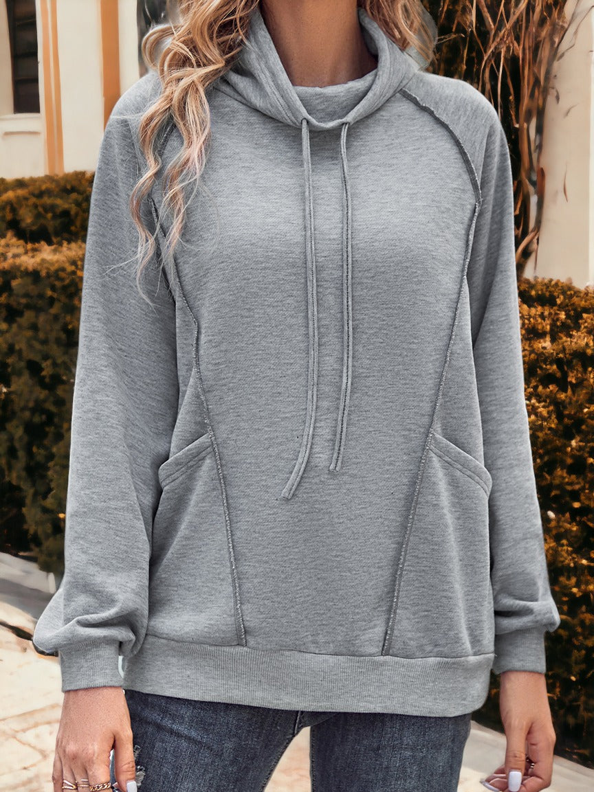 Sudadera con capucha holgada y costuras en contraste