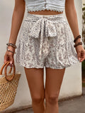 High-Waisted Floral Print Shorts with Tie Waist and Ruffle Hem
