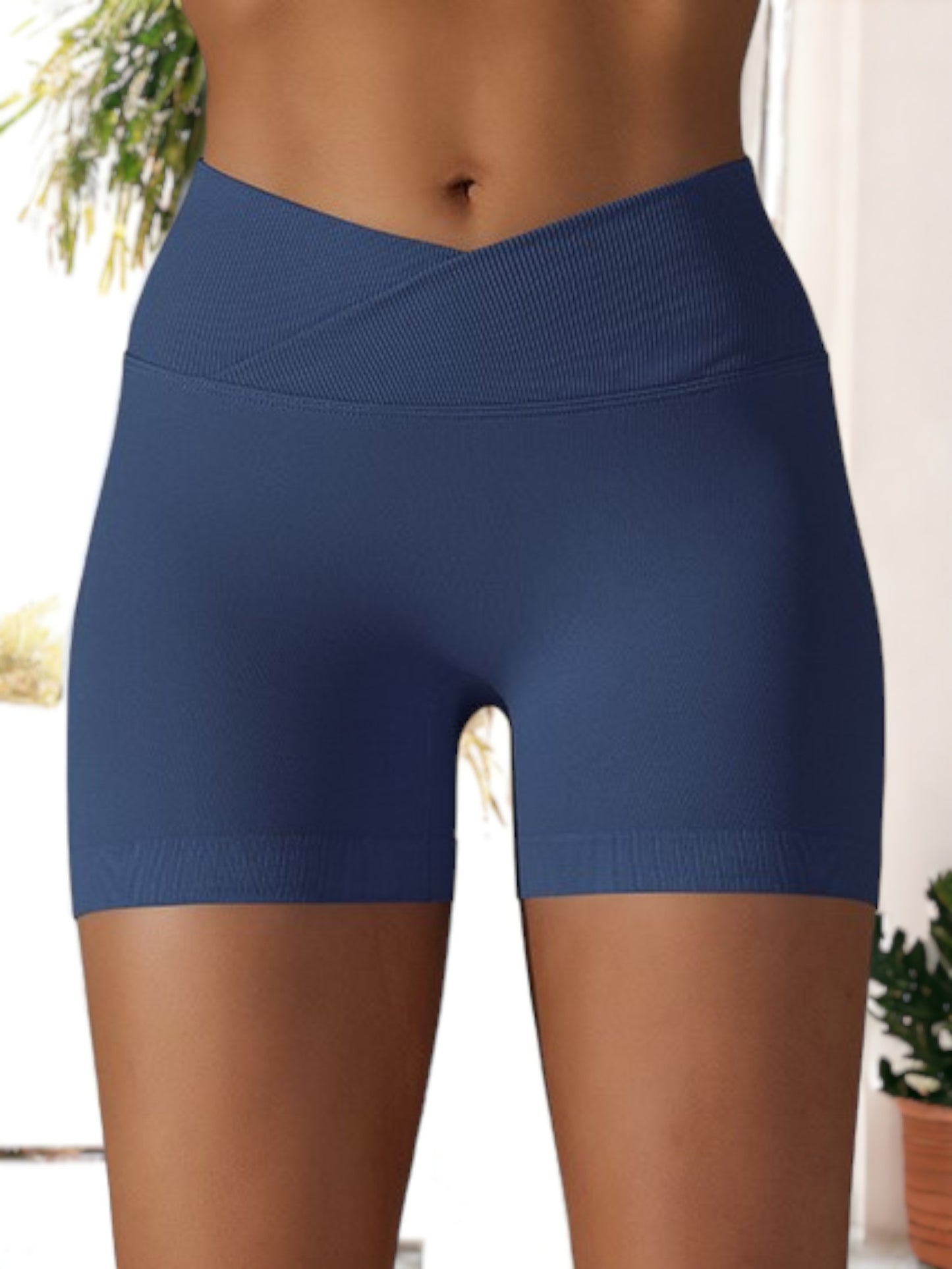 Pantalones cortos deportivos de yoga ajustados con cintura cruzada y sin costuras