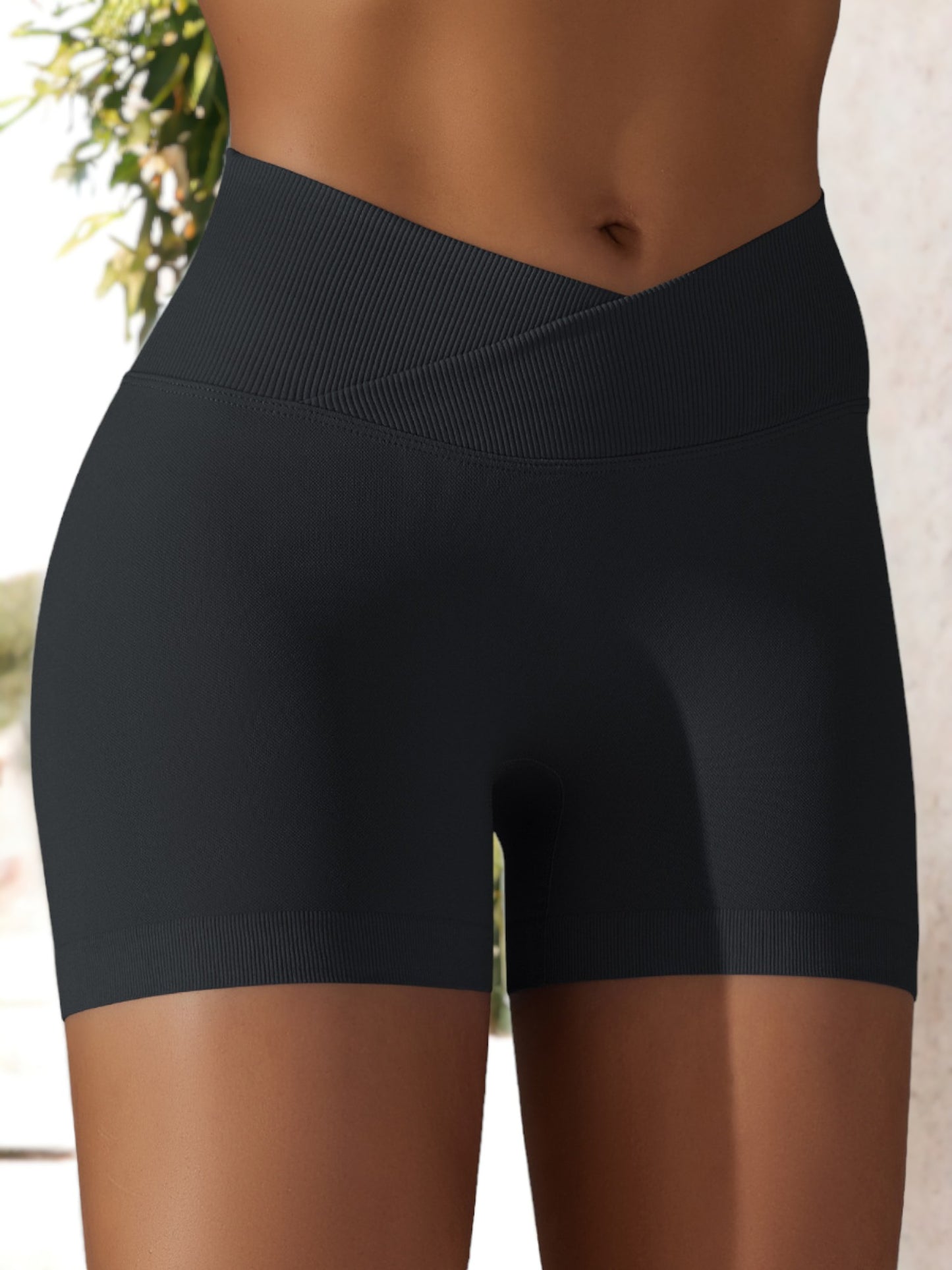 Pantalones cortos deportivos de yoga ajustados con cintura cruzada y sin costuras