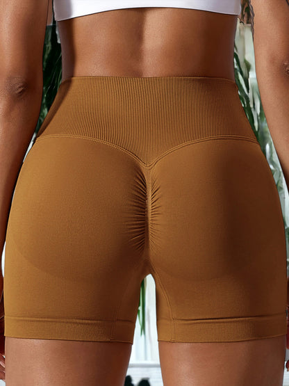 Pantalones cortos deportivos elásticos de cintura alta sin costuras