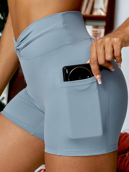 Pantalones cortos ajustados de fitness para mujer que realzan los glúteos