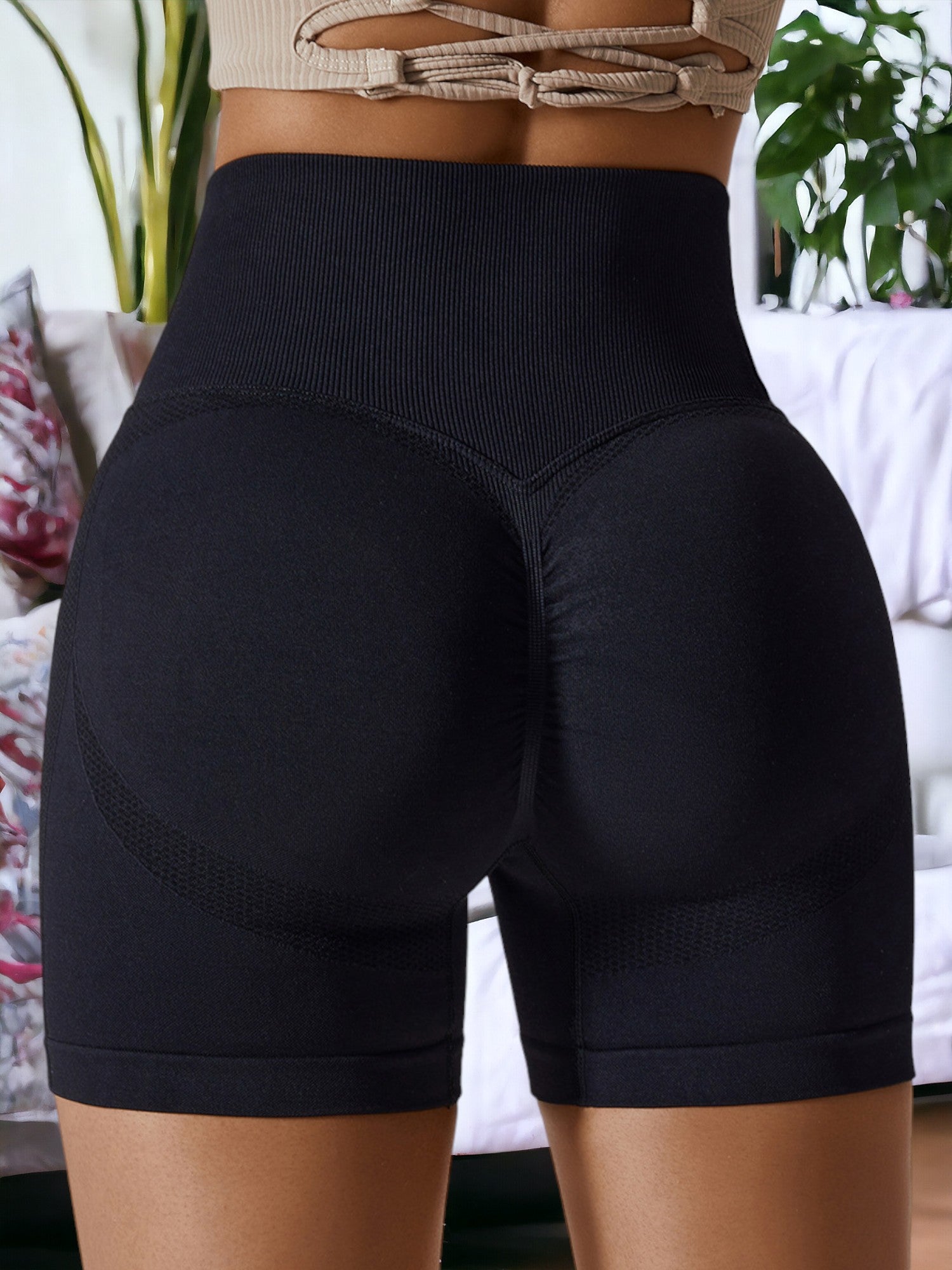 Pantalones cortos deportivos ajustados de cintura alta que realzan la cadera