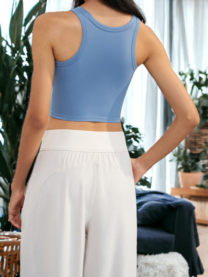 Top de yoga y fitness con copa fija