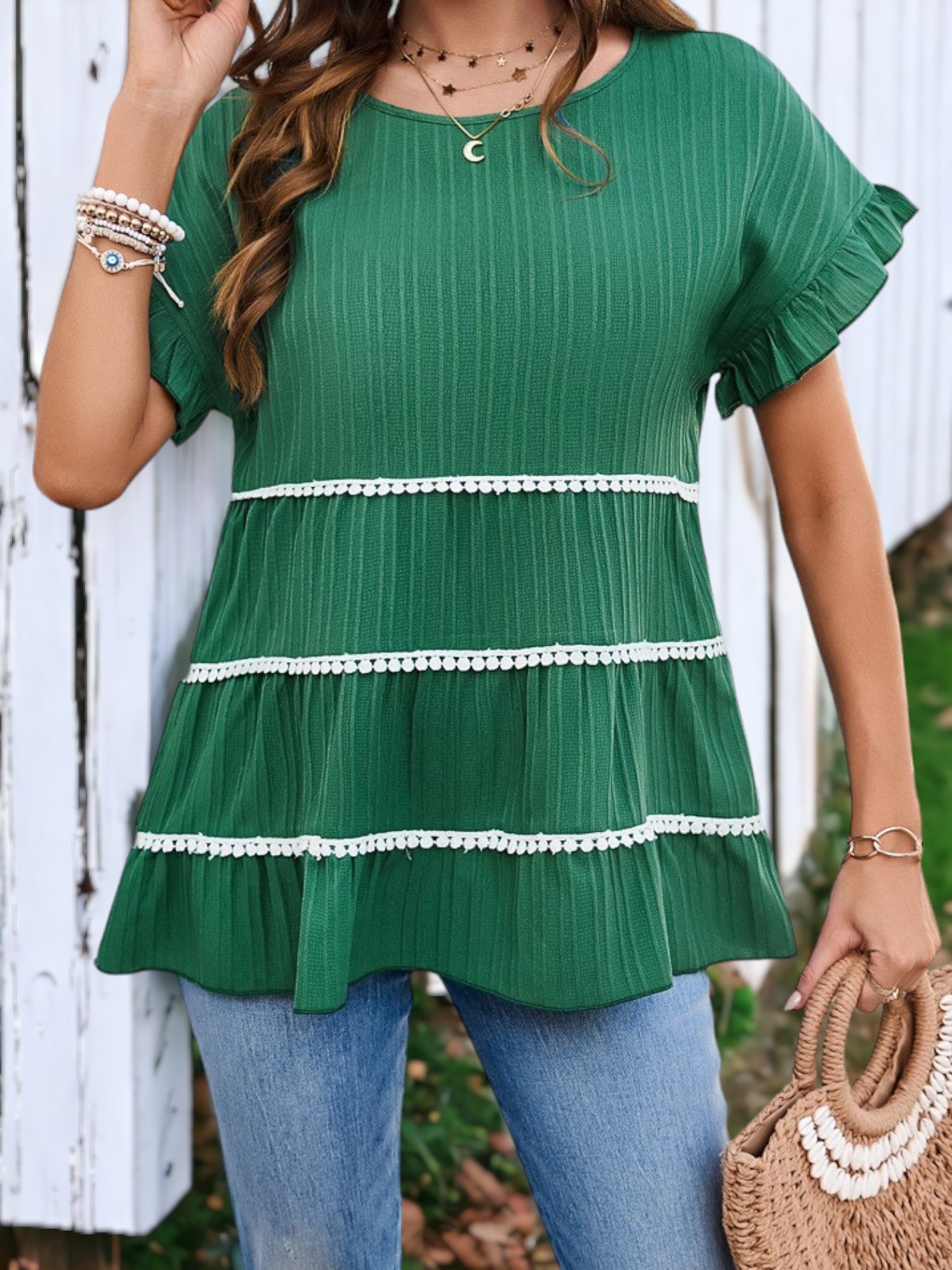 Blusa suelta con cuello redondo y mangas con volantes