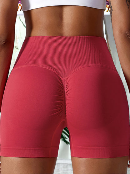 Pantalones cortos deportivos elásticos de cintura alta sin costuras