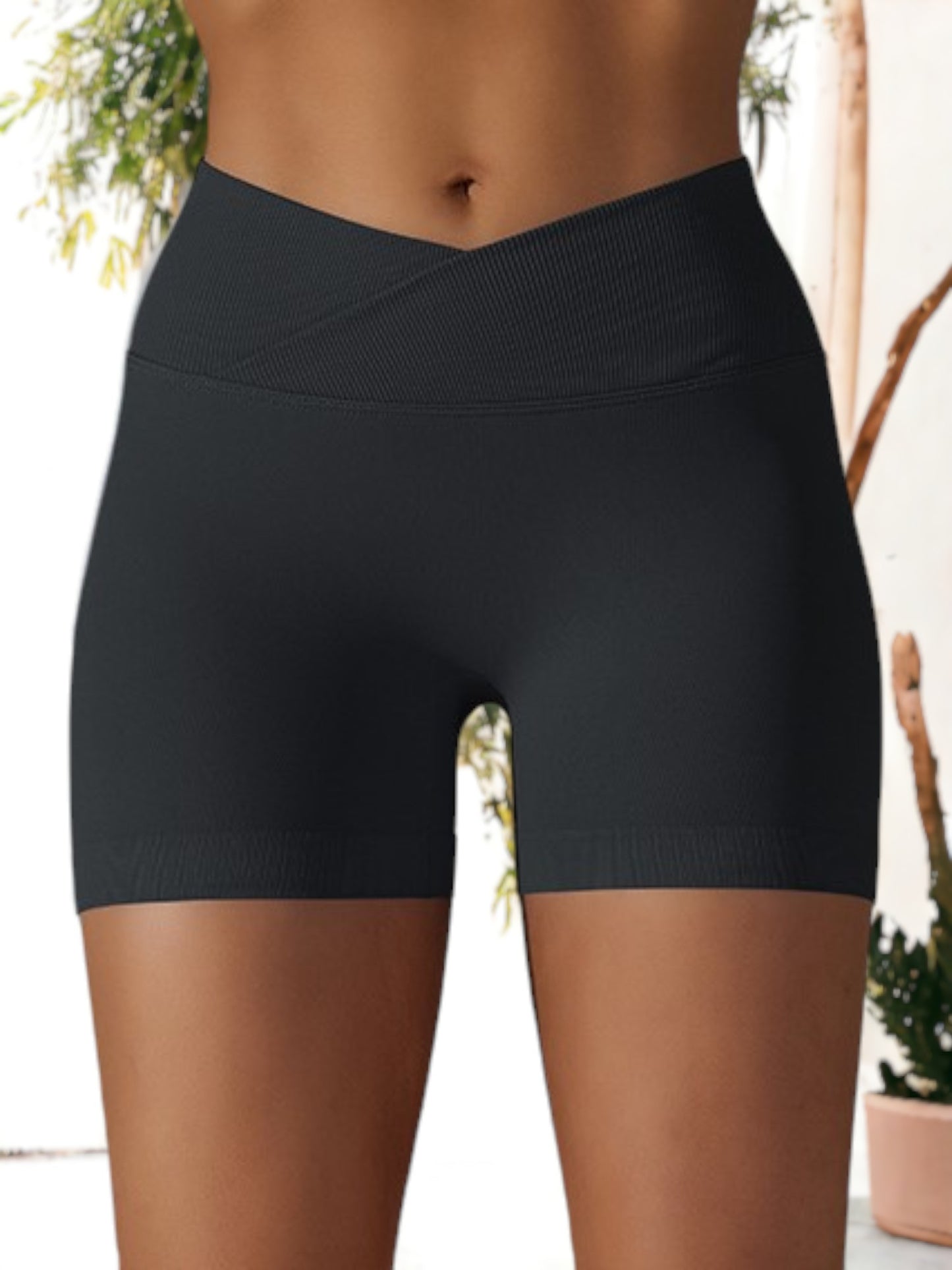 Pantalones cortos deportivos de yoga ajustados con cintura cruzada y sin costuras