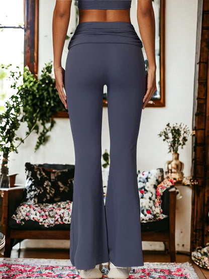 Pantalones ajustados de cintura alta que realzan los glúteos