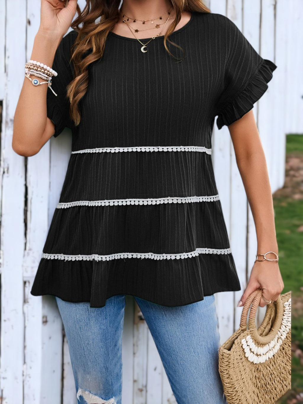 Blusa suelta con cuello redondo y mangas con volantes