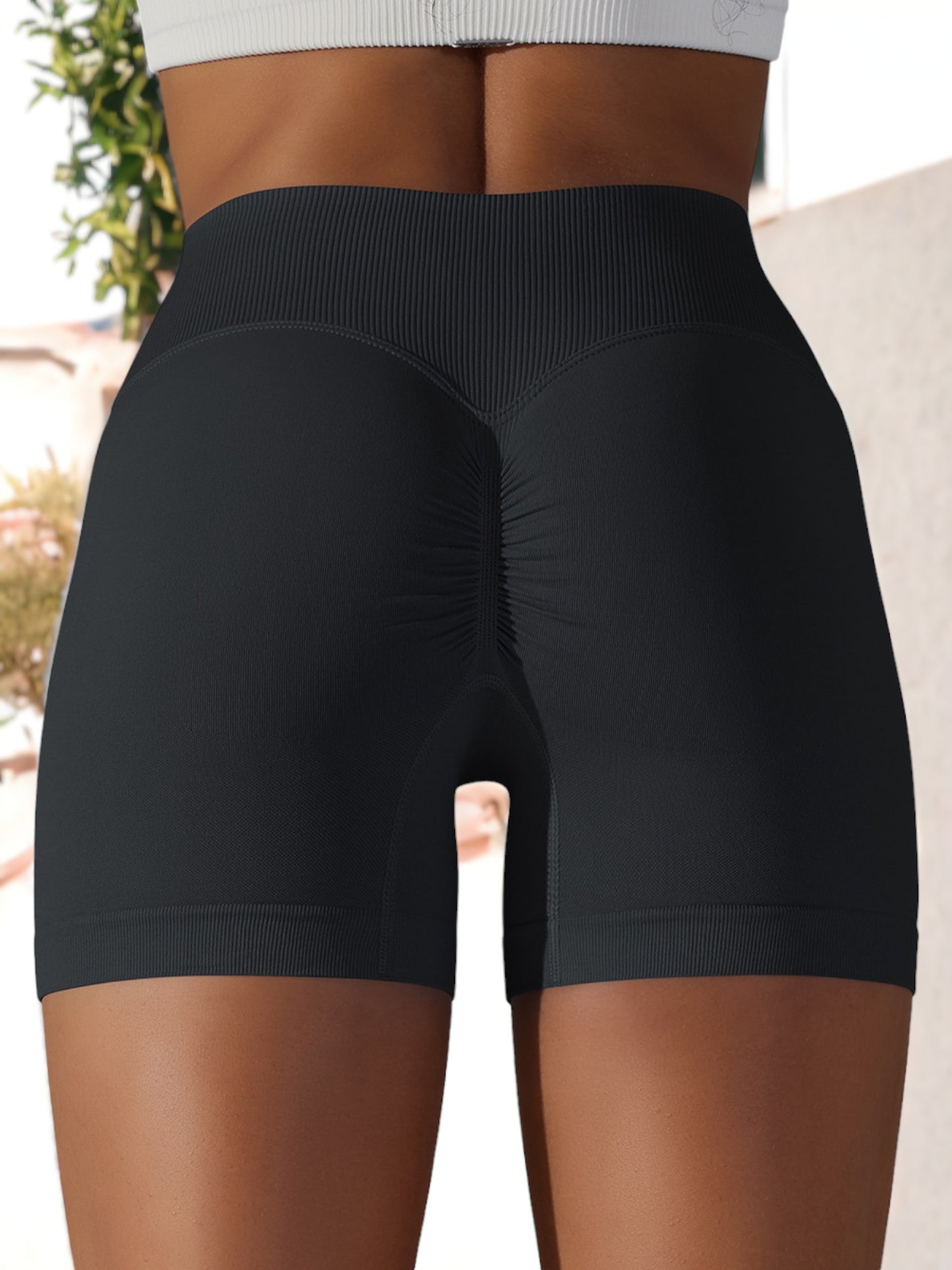 Pantalones cortos deportivos de yoga ajustados con cintura cruzada y sin costuras