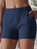 Pantalones cortos deportivos de cintura alta para mujer de Anna-Kaci con cinturilla elástica y bolsillos laterales