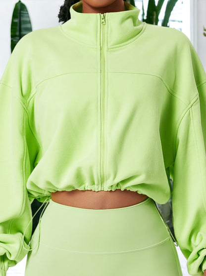 Chaqueta deportiva holgada de manga larga con cremallera