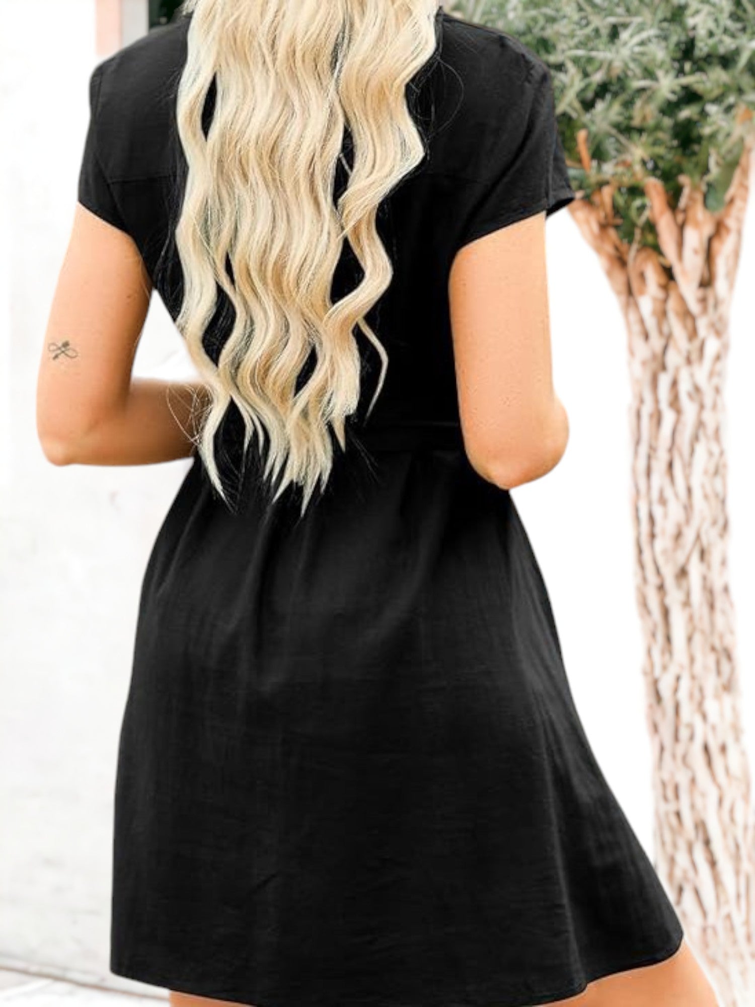 Vestido tipo túnica con cinturón y mangas dolman con botones y detalles