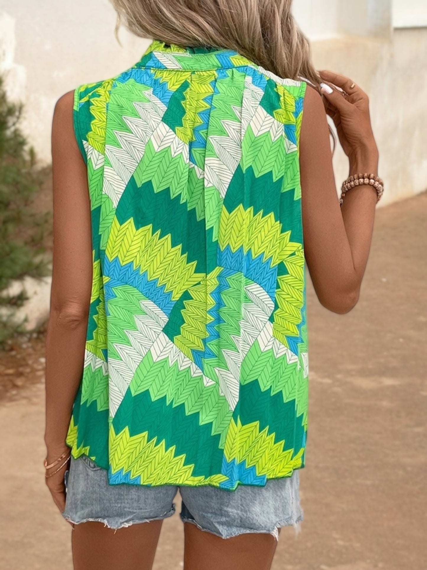 Sleeveless Printed Top with Keyhole Tie Neck and Chevron Pattern