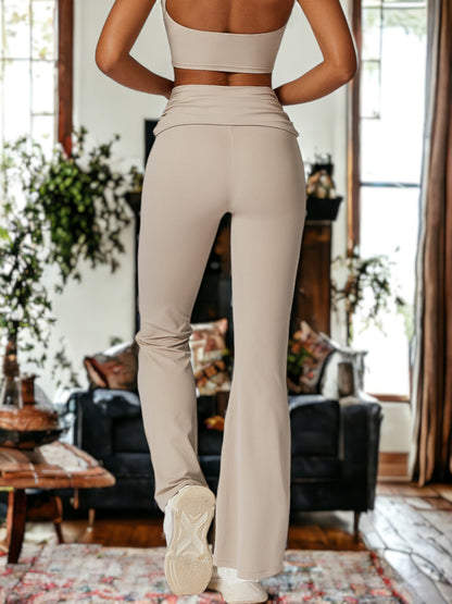 Pantalones ajustados de cintura alta que realzan los glúteos