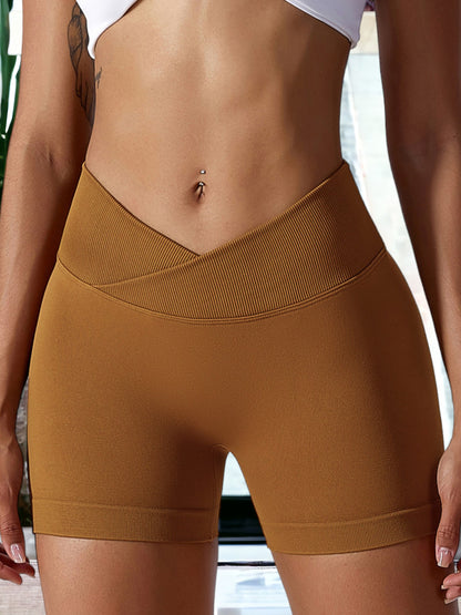 Pantalones cortos deportivos elásticos de cintura alta sin costuras