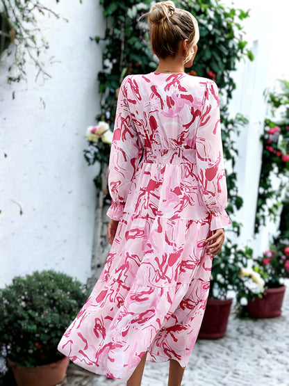 Vestido largo con escote cruzado y estampado abstracto