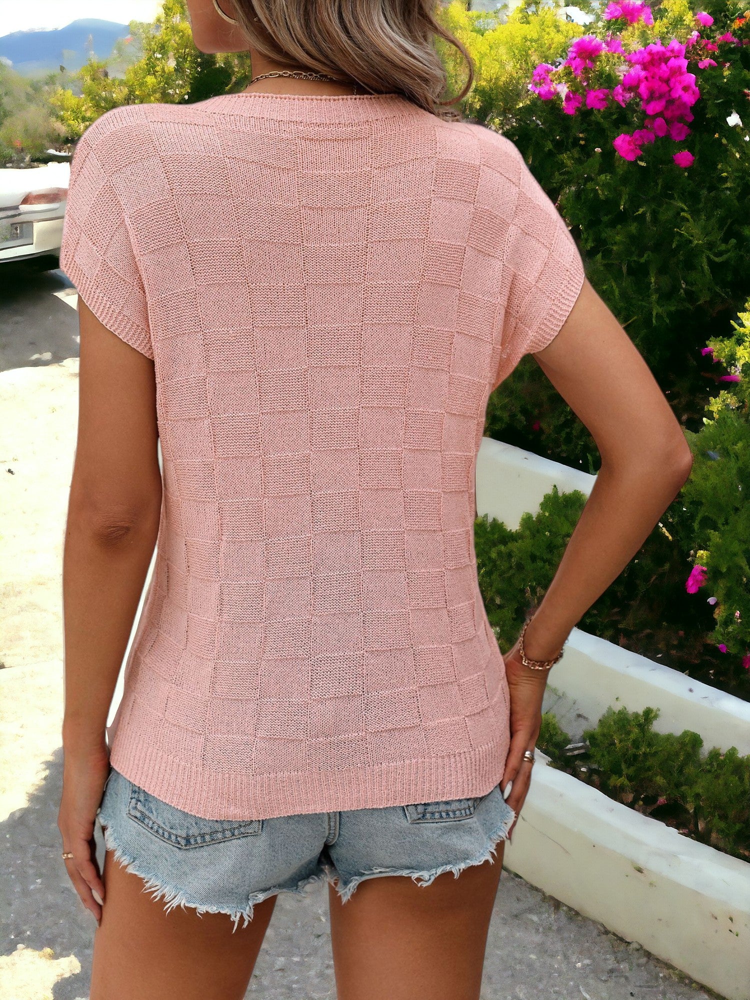 Camisa tipo pulóver con cuello redondo, bolsillos laterales y estampado de cuadros detallados