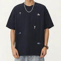 Anna-Kaci Men's Short Sleeve Graphic T-Shirt with Minimal Embroidered Details