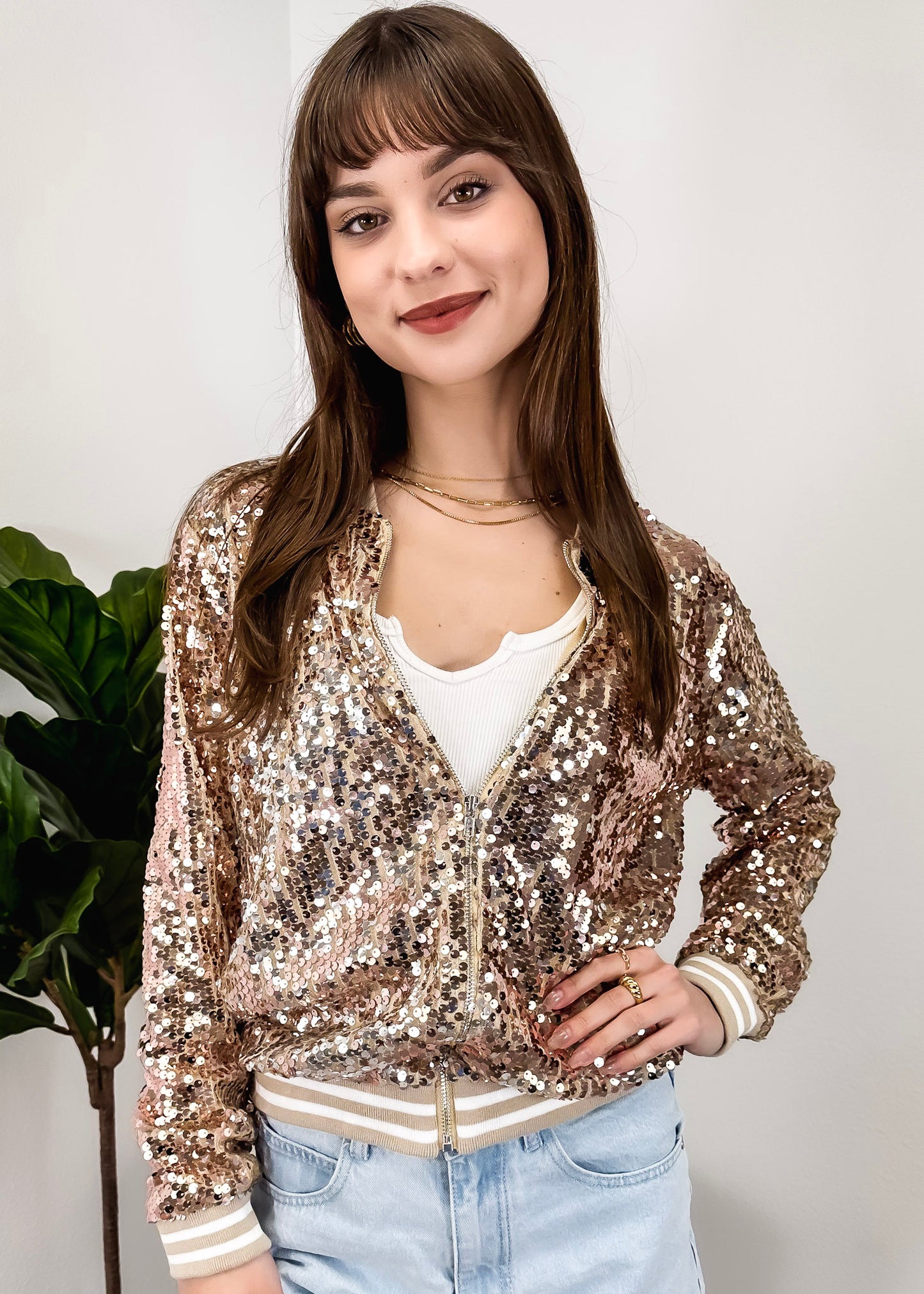 Chaqueta universitaria con lentejuelas metálicas a rayas