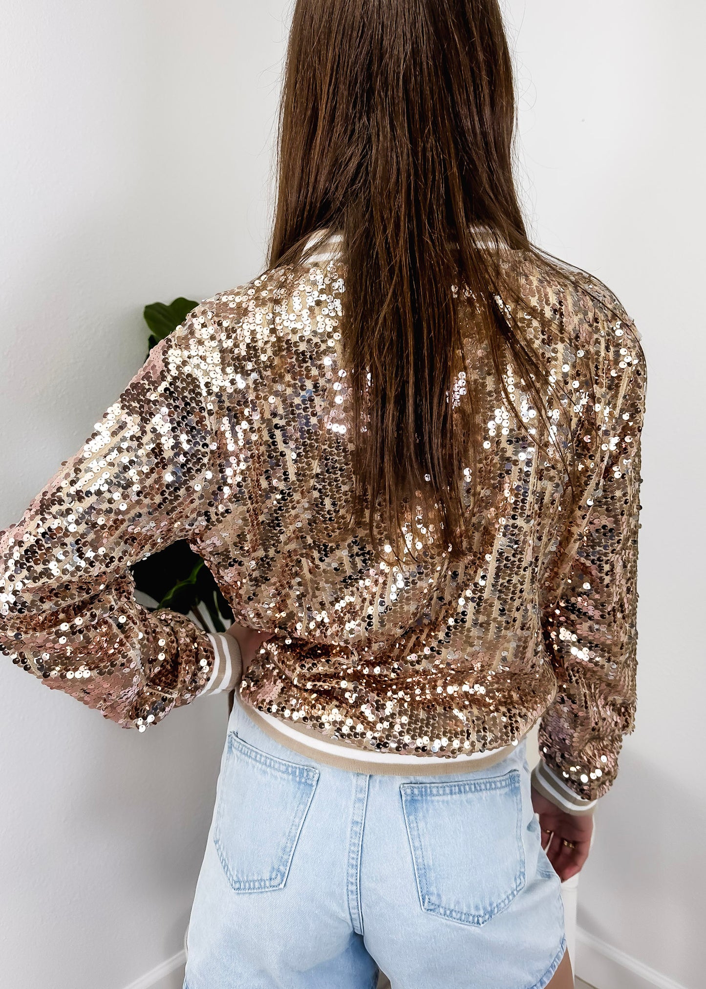 Chaqueta universitaria con lentejuelas metálicas a rayas