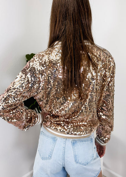 Chaqueta universitaria con lentejuelas metálicas a rayas