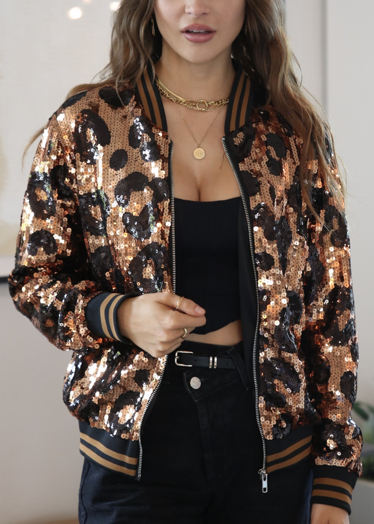 Chaqueta universitaria con lentejuelas metálicas a rayas