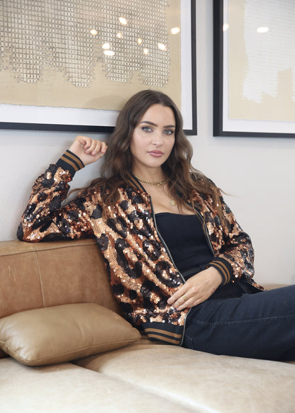 Chaqueta universitaria con lentejuelas metálicas a rayas