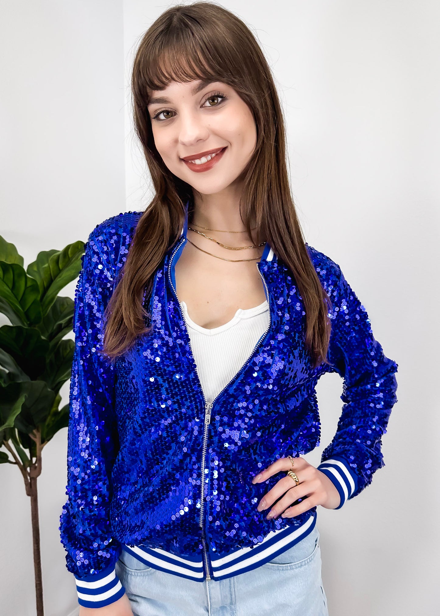 Chaqueta universitaria con lentejuelas metálicas a rayas
